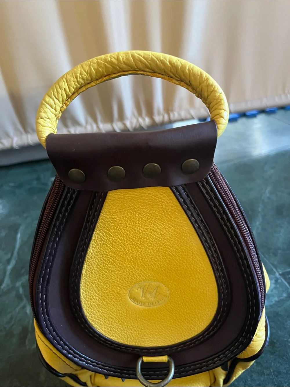 Yellow Leather Backpack with Dark Brown Trim and Top Handle